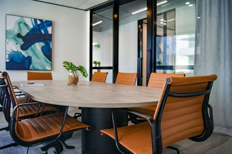 Brown wood 9-piece office table and chairs